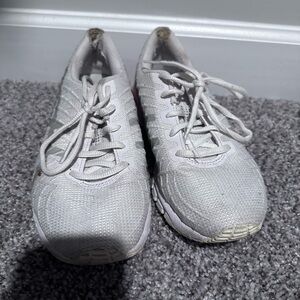 ASICS women’s shoe. Worn